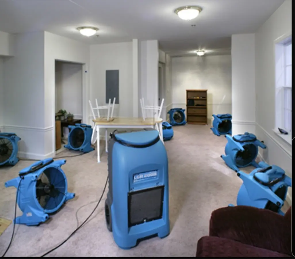 Air movers and dehumidifier setup for Water Damage Restoration in South Cleveland